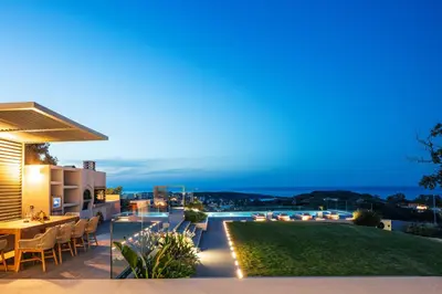 a villa with a view at night at Centro Golden View Villa in Chania Town