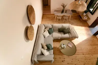 an overhead view of a living room with a couch at Monastery apartment, a unique house in Chania Town