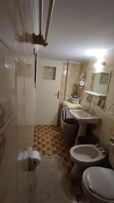 a bathroom with a toilet and a sink at Dominic Chania Center Apartment in Chania Town