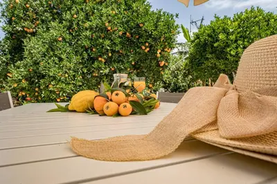 a table with a basket of pumpkins and a bow at Olga's Organic garden Home for a couple! with Wifi & AC in Chania Town