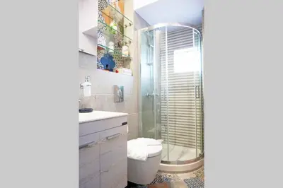 a bathroom with a shower and a toilet and a sink at C-Home Studio in the heart of Chania in Chania Town