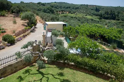 an aerial view of a house with a garden at Hilltop Villa Kontomari in Kondomari