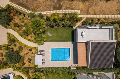 an overhead view of a building with a swimming pool at Ethereal Villas Chania in Daratso