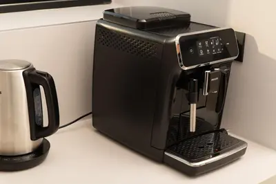 a black coffee maker sitting on a counter at Chic Dream Villa in Agios Onoufrios