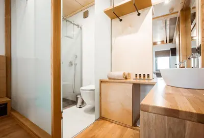 a bathroom with a white sink and a toilet at Thallos The Boutique in Chania Town