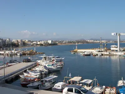 a bunch of boats docked in a harbor at Marika's Penthouse Chania in Chania Town