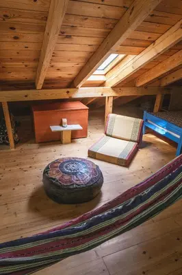 an overhead view of a room in a log cabin at Hani Kastania - Chania retreat for families and groups for holidays and workshops in Sémbronas