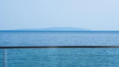 a view of a large body of water at Sfakia Seaside luxury Suites in Khóra Sfakíon