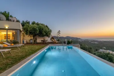 a villa with a swimming pool with a view at Villa Maritini in Chania Town