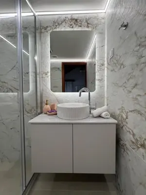 a bathroom with a sink and a mirror at SeaView villa with piano by Chania Living Stories in Chania Town
