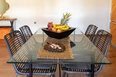 a glass table with a bowl of fruit on it at Chania dream apartment in Chania Town