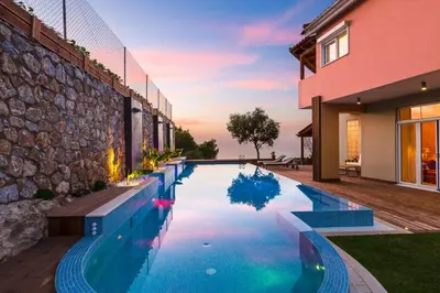 a swimming pool in the backyard of a house at Casa di Goya in Chania Town