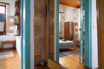 a hallway with a mirror in a room at Lindas Convent Garden Home 4 in Chania Town