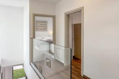 a bathroom with a mirror and a sink at Villa Valentina Chania in Kalathas