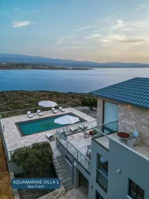 an aerial view of a building with a swimming pool at Seacrete villas in Chania Town