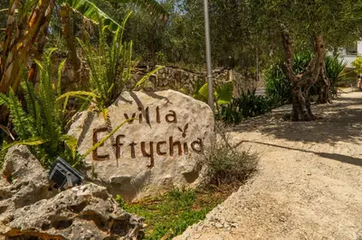 a rock with the words nilla fijiipedia written on it at Villa Eftychia - villa with 2 private pools!!! by PosarelliVillas in Almirida