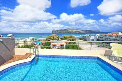 a swimming pool with a view of the ocean at Cabanavillas MILANO by PosarelliVillas in Agia Marina Nea Kydonias