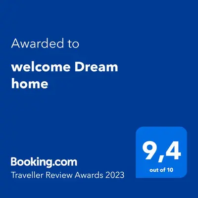 a blue screen with the text awarded to welcome dream home at welcome Dream home in Chania Town