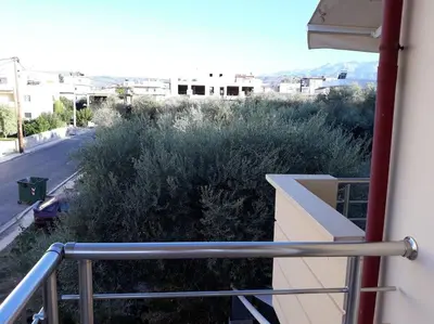 a balcony with a view of a street at Roof-Garden Apartment in Chania Town