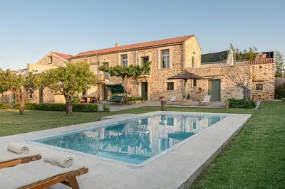 a house with a swimming pool in the yard at Ondathaki Pirgos in Pírgos Psilonérou