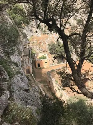 an aerial view of a building on a mountain at Grey House in Chorafakia