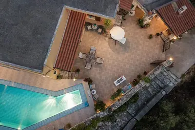 an overhead view of a swimming pool at a hotel at Villa Kritiko Archontiko in Koprána