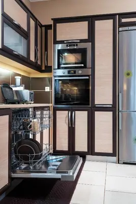 a kitchen with a dishwasher and a sink at Villa Kalaitsidi - plunge pool, gym and unique gardens in Skinés