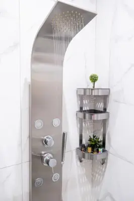 a bathroom with a shower with a plant in it at ÉTHAFOS Luxury Apartment in Tsikalariá