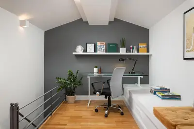 an office with a desk and a chair in a room at Orion Chania Boutique City House in Chania Town