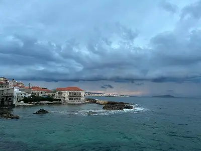 a group of houses on the shore of the ocean at Villa Yasemi panoramic sea view in Chania Town