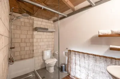 a bathroom with a toilet and a shower at Villa Yasemi panoramic sea view in Chania Town