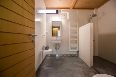 a bathroom with a sink and a toilet at Villa Yasemi panoramic sea view in Chania Town