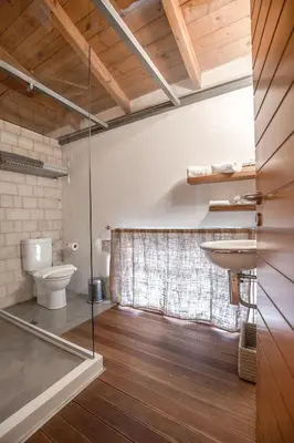 a bathroom with a toilet and a sink at Villa Yasemi panoramic sea view in Chania Town
