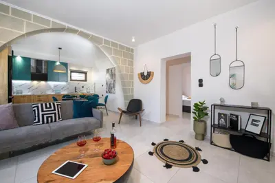 a living room with a couch and a table at Anastasia & Maria Luxury Residence in Kissamos