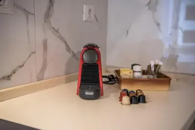 a red blender sitting on top of a counter at Dinas's Cottage Ideal Base for Balos and Elafonisi in Kaloudhianá