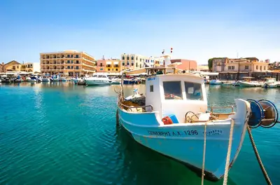 a boat is docked in the water in a harbor at Arch 4 Luxury Living in Chania Town
