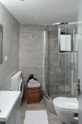 a bathroom with a shower and a toilet and a sink at ERIS House in Kissamos