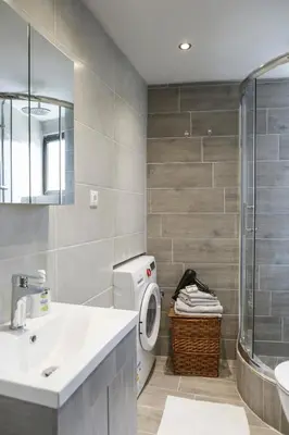 a bathroom with a sink and a toilet and a shower at ERIS House in Kissamos
