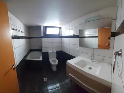 a bathroom with a toilet and a sink at Souda apartment in Souda