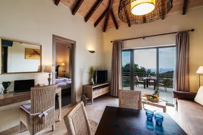 a living room with a couch and a table at Christos Place-Anidri in Palaiochóra