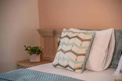a bed with two pillows on top of it at Michael's Villa in Kissamos