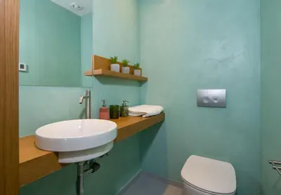 a bathroom with a sink and a toilet at Villa Night Flower in Chania Town