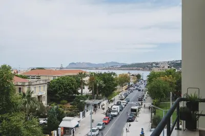 a view of a city street with cars parked at D&G Lux Flat City View next to Old Town & Market in Chania Town