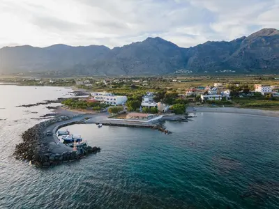 an aerial view of a small island in the water at Mylos Seaside Experience in Frangokastello
