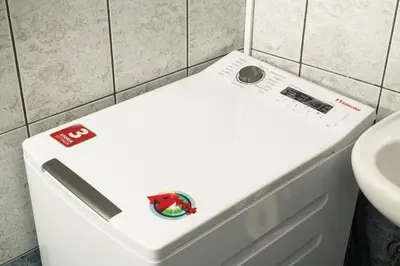 a white bathroom with a toilet and a sink at ''Meraviglia casa'' Irida apartment in Chania Town