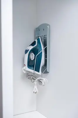 a blue and white train hanging on a door at ''Meraviglia casa'' Ariadne in Kato Daratso