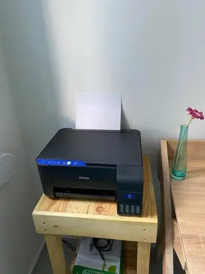 a printer sitting on top of a wooden table at Villa Panorama Modi, with pool and stunning views in Chania Town