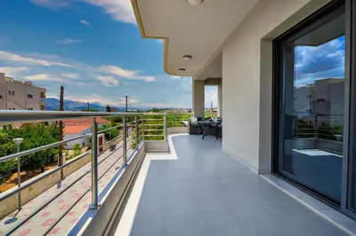 a balcony of a building with a view at Fotini 's apartment near the city center. in Chania Town