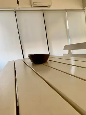 a bowl sitting on top of a table in a room at Aggelos and Thisbe Chania City Apartment in Chania Town