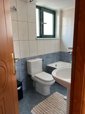 a bathroom with a toilet and a sink at Antonis Kavros appartment in the center of chania in Chania Town
